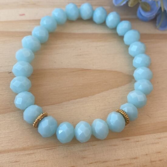 Pulseira cristal sem pingente com sepador dourado azul bebê